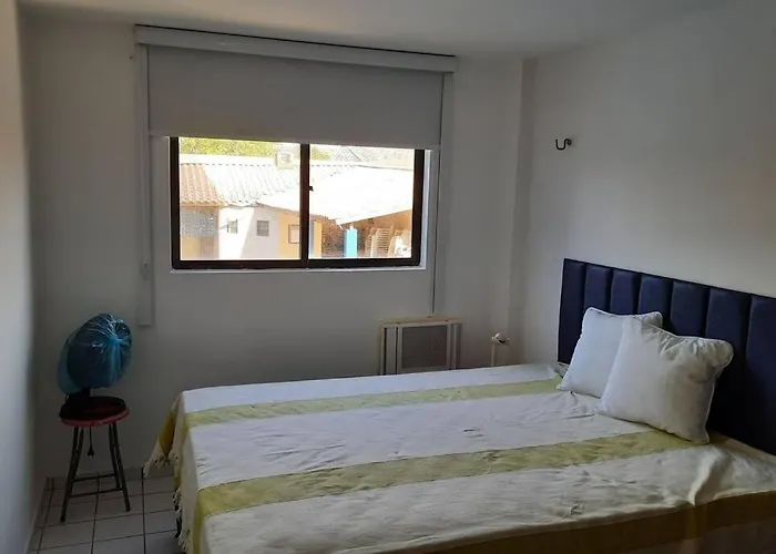 Apartamento azul no condomínio Mar de Cotovelo